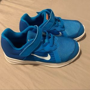 Blue Kids Nike shoes